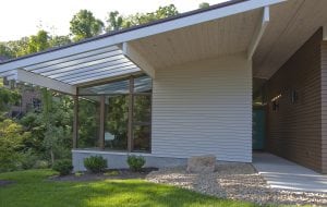 modern home with retro touches and Hardie plank siding